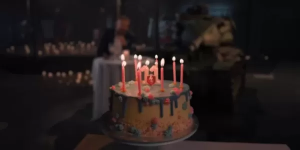 Jan Blachowicz toasting with a tank covered in birthday candles