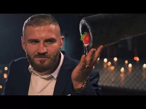 Jan Blachowicz celebrating with a tank in World of Tanks Blitz anniversary ad